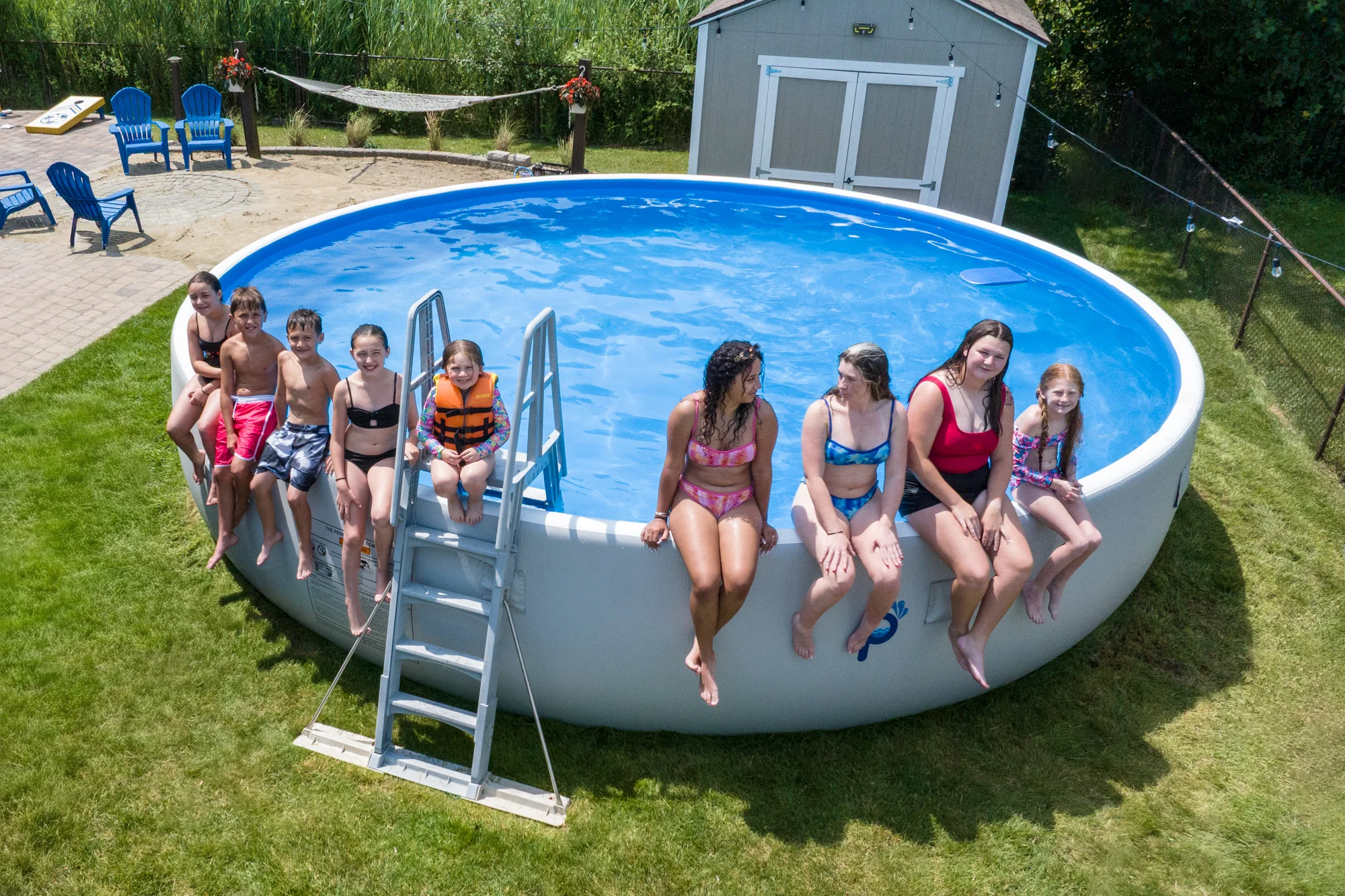 Two people installing a Perfect Pool