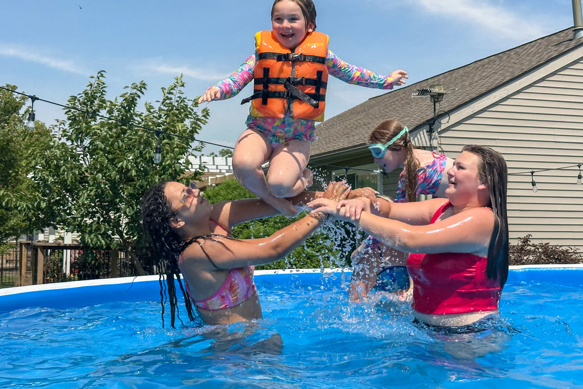 Family relaxing by a Perfect Pool